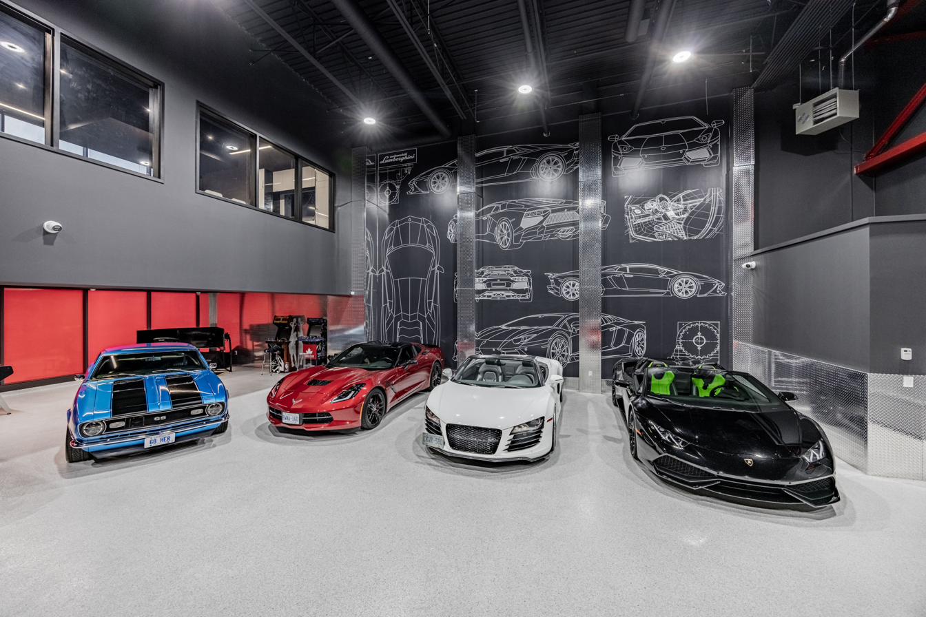 Showroom floor beneath the blueprint mural.