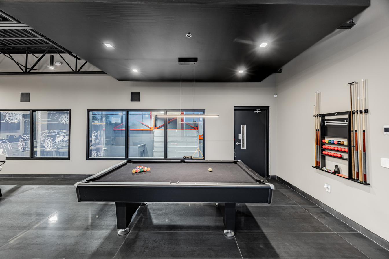 Pool table and cue rack.